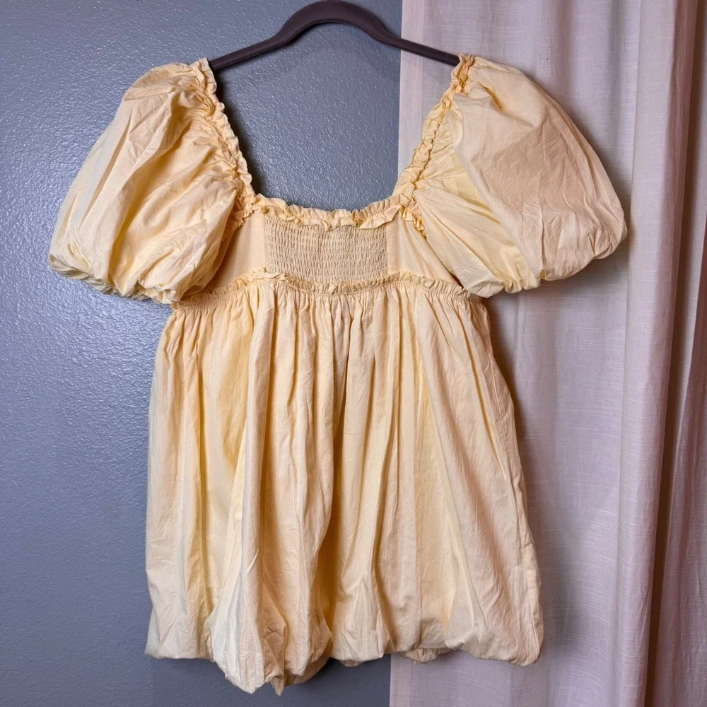 Free People Top Womens M Yellow Bubble Hem Babydoll Puff Sleeve Ruffle Smocked